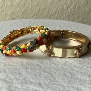 Starfish bracelets- hinged closure- gold tone- has wear on gold tone